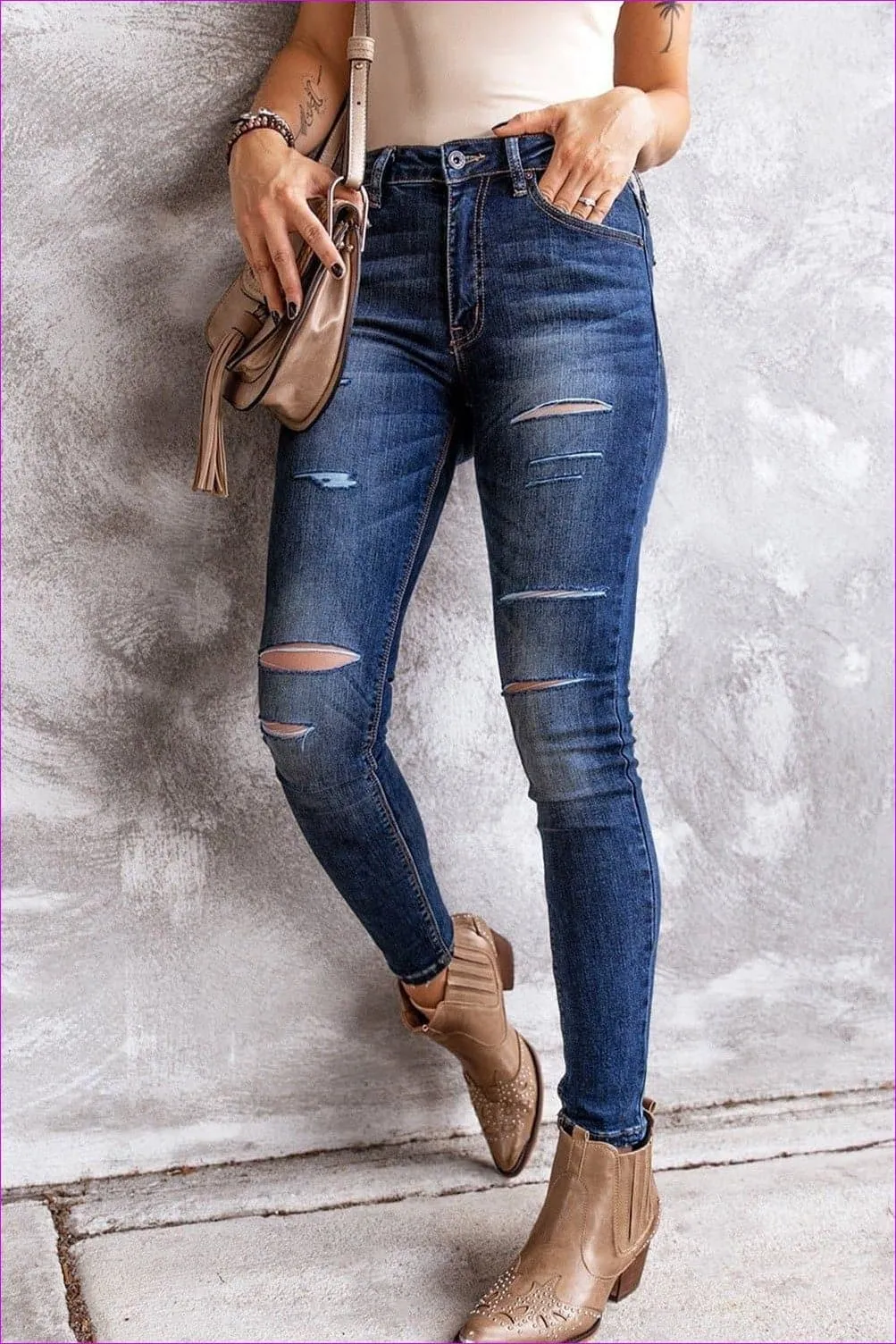 Ripped High Rise Ankle Length Skinny Jeans
