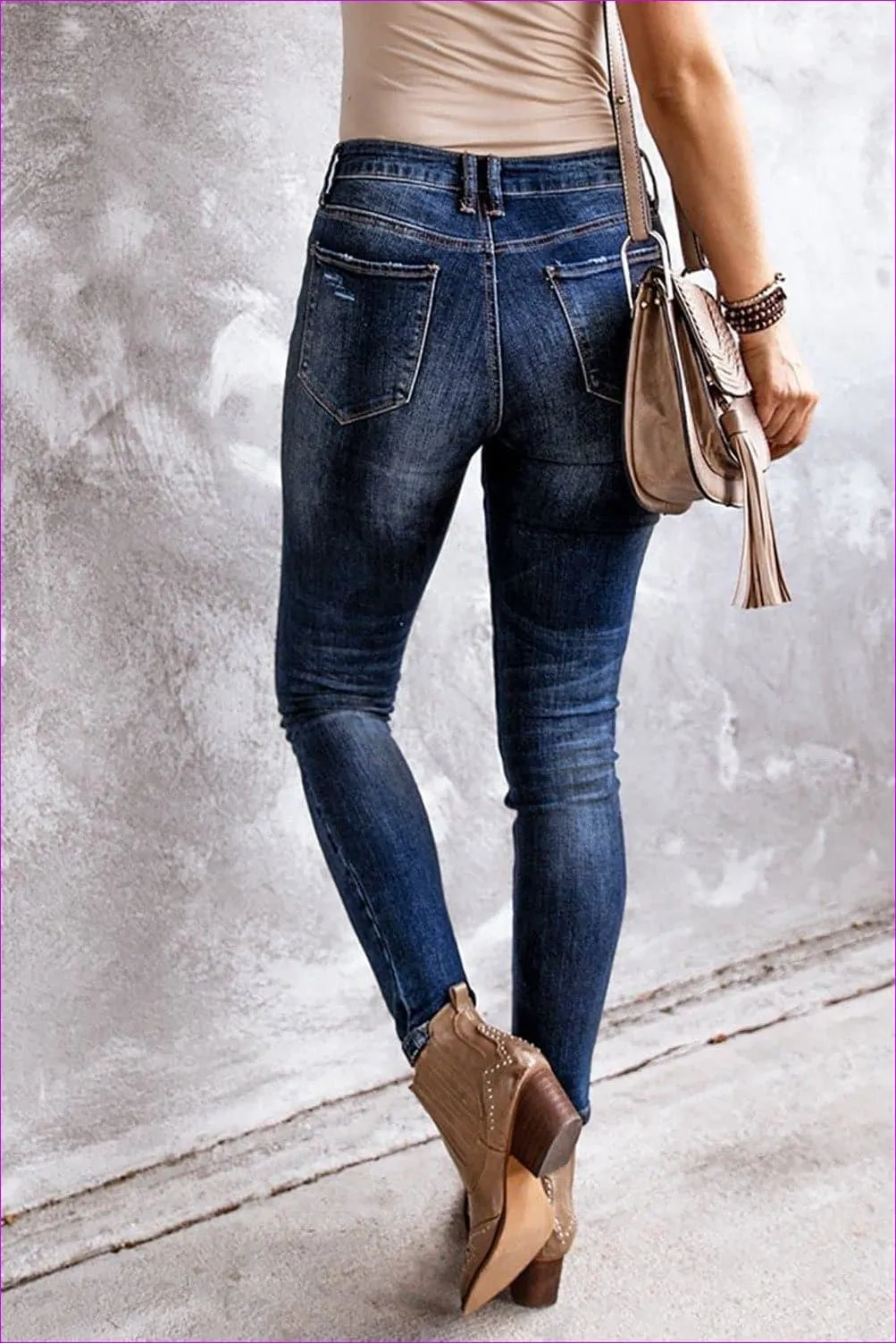 Ripped High Rise Ankle Length Skinny Jeans